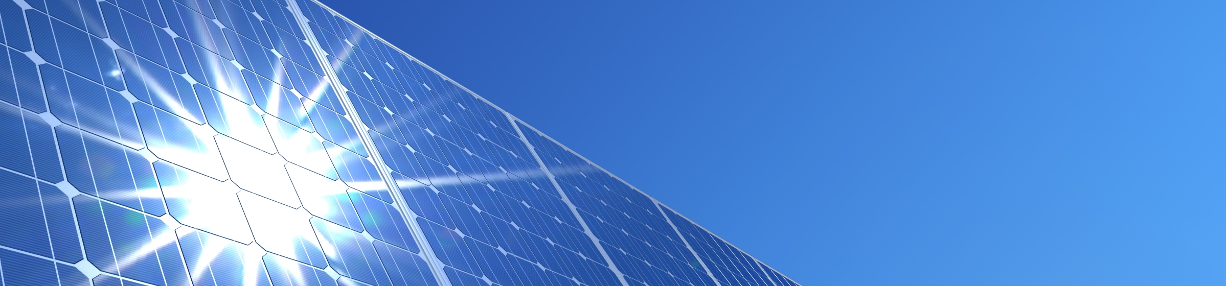 Solar panels reflecting sun