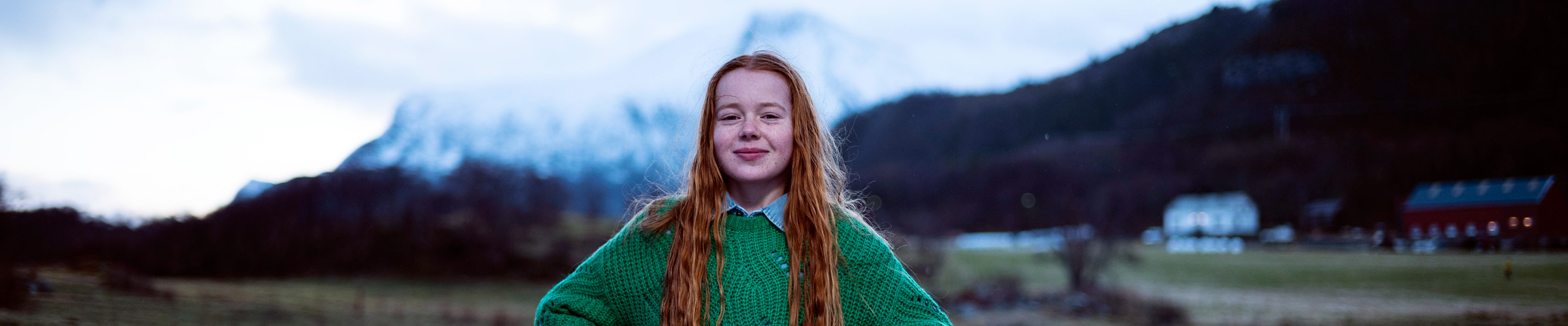 Girl in green sweater
